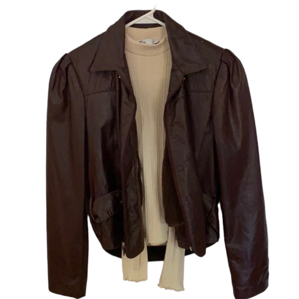 Vintage 1980’s hand tailored motorcycle jacket in Burgundy.